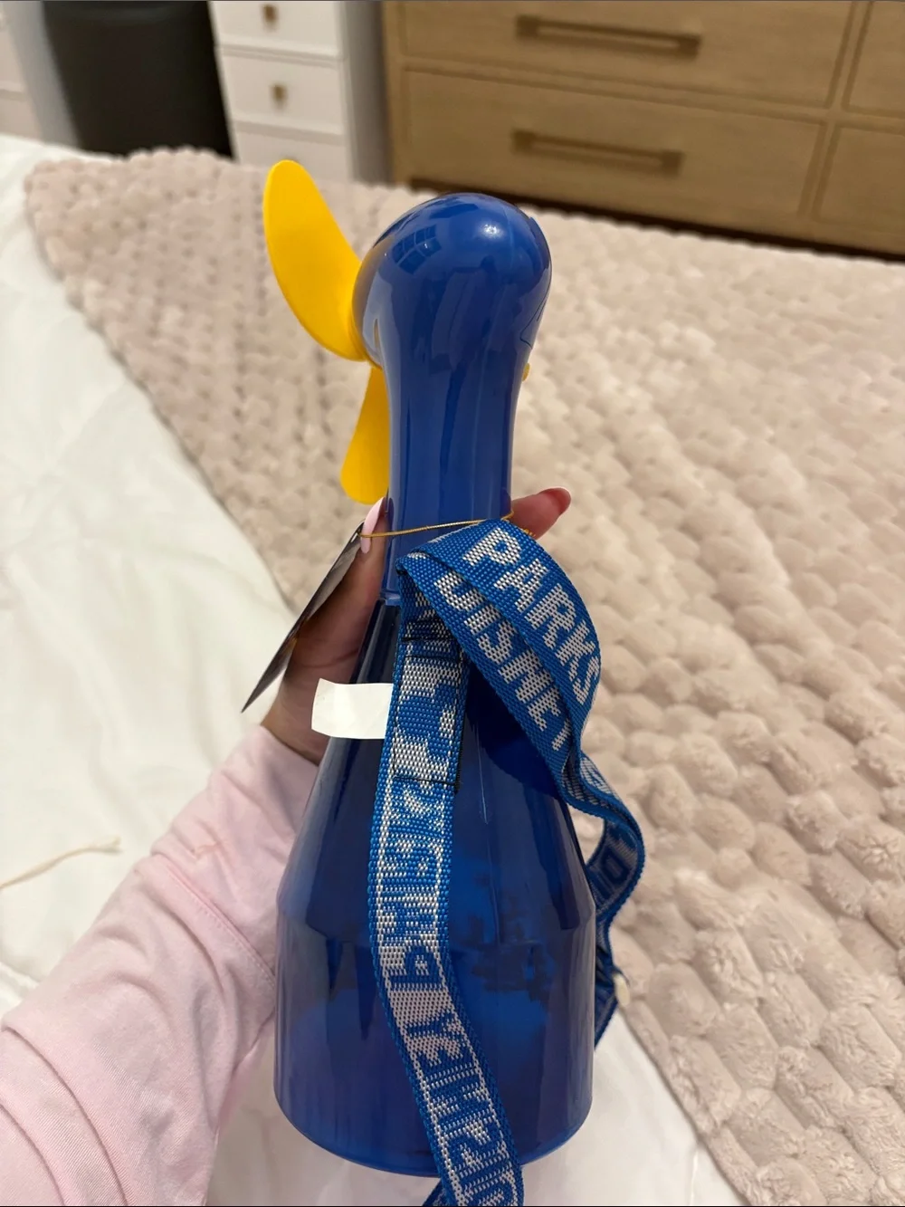 Discontinued Disney Blue Handheld Fan with Yellow Blades and Character Strap
